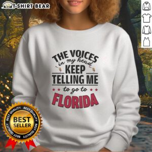 Cozy 'The Voices In My Head Keep Telling Me To Go To Florida' sweatshirt, perfect for casual wear and travel enthusiasts.