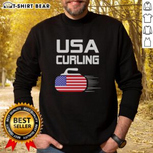 Alt Text: Official USA Curling sweatshirt featuring an American flag design and a stone graphic, perfect for curling fans.