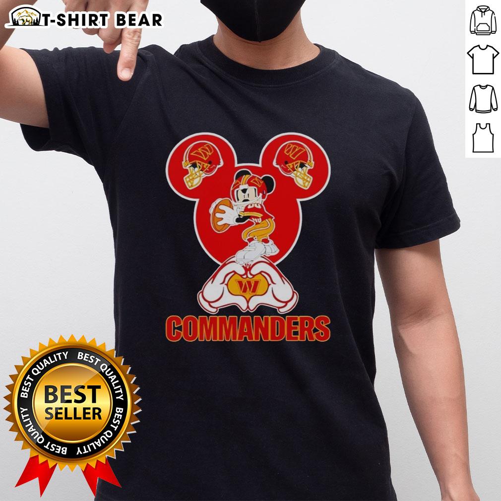 Alt Text: Official Washington Commanders Mickey Mouse Love Heart T-Shirt featuring a playful design with team colors and logo.