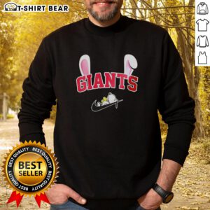 Pretty New York Giants x Snoopy Happy Easter sweatshirt featuring vibrant colors and festive design for fans.