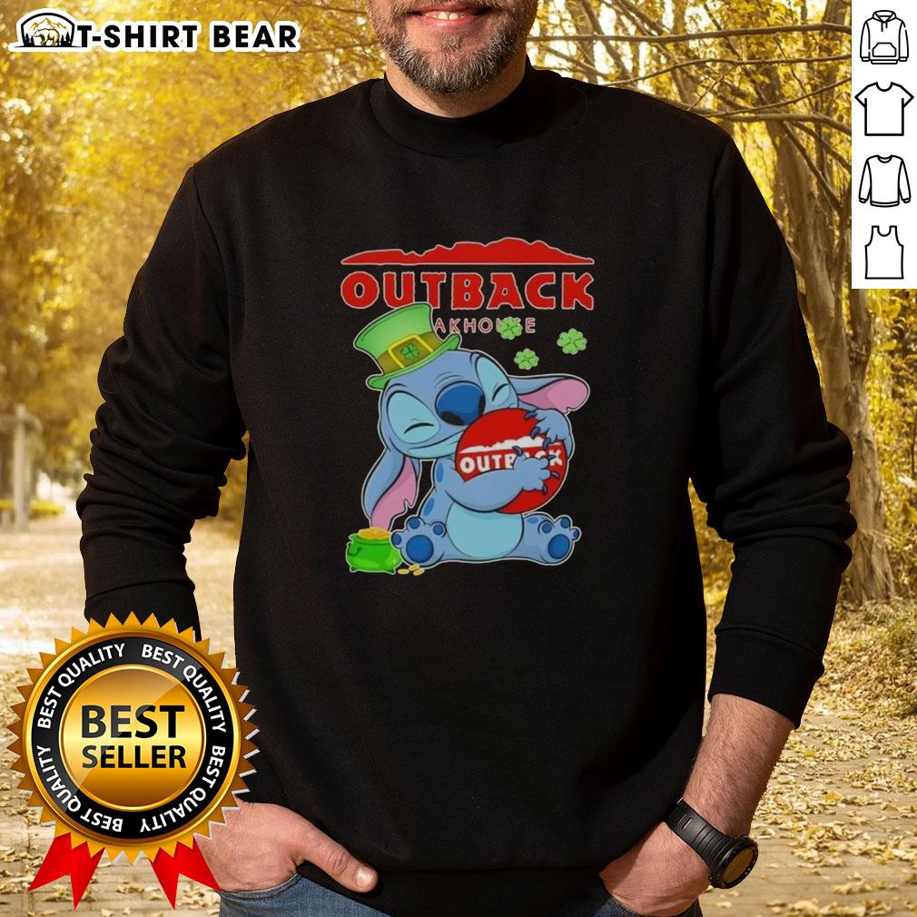 Pretty Stitch Hug Outback Steakhouse logo on a Happy St. Patrick's Day sweatshirt, showcasing festive style.