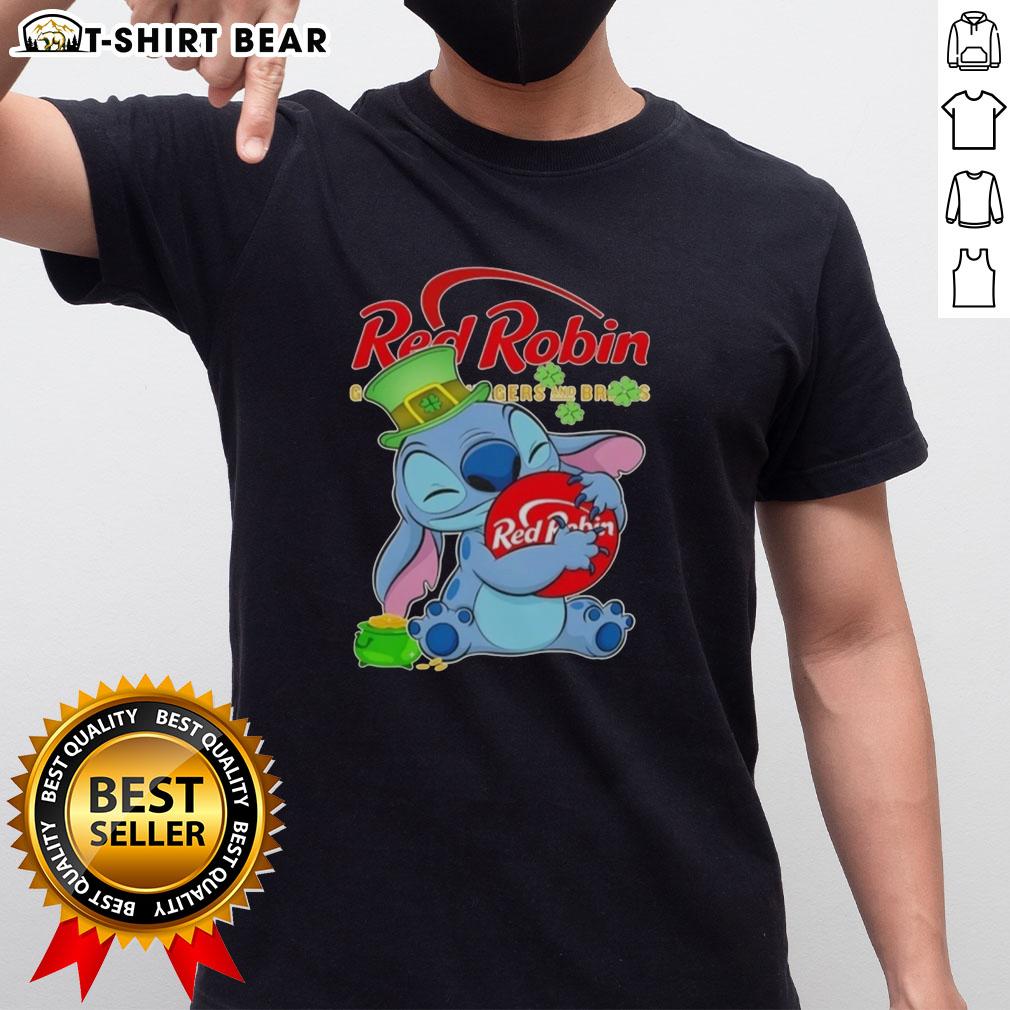 Pretty Stitch Hug the Red Robin logo on a Happy Patrick's Day T-shirt, perfect for festive celebrations.
