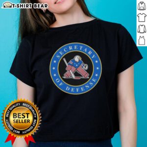 Alt Text: Top Secretary of Defense Team USA Hockey Ladies Tee featuring the official logo and vibrant colors for fans.