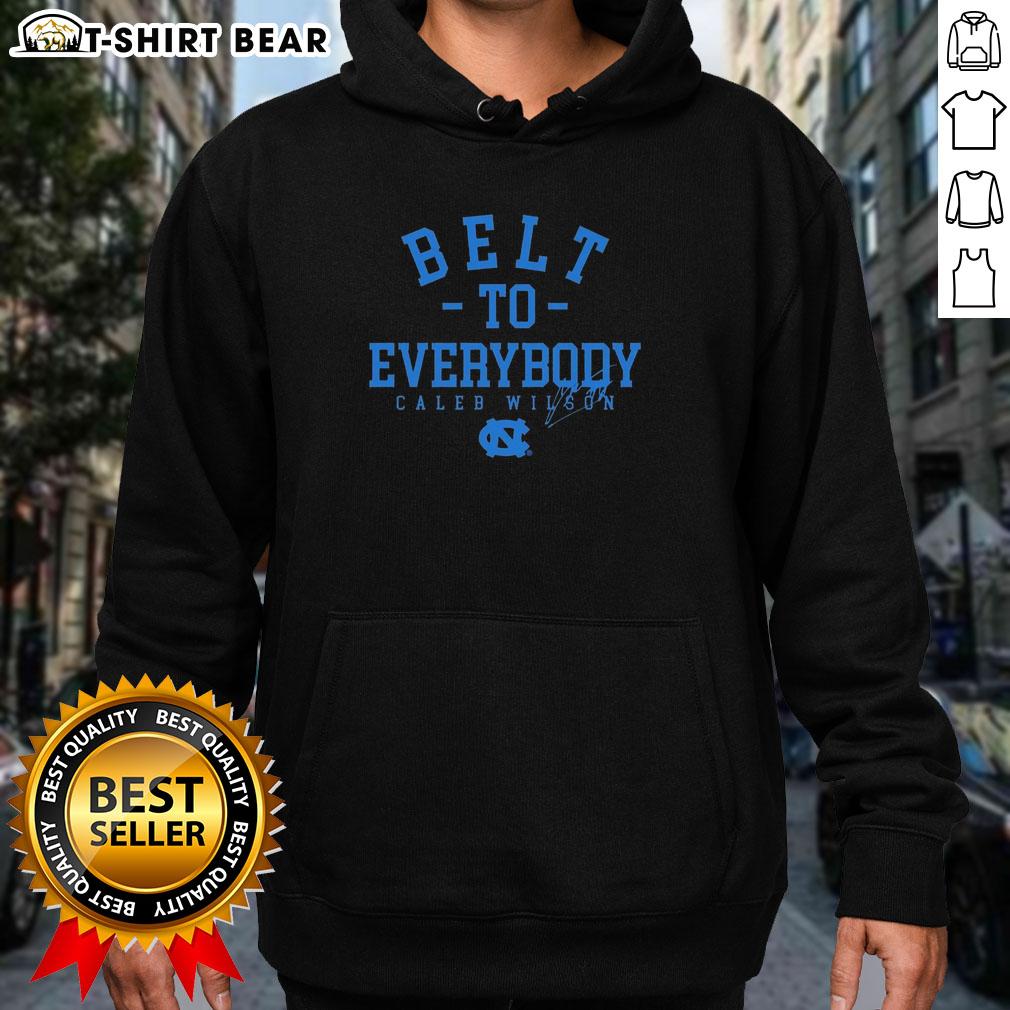 Caleb Wilson wearing a signature hoodie at UNC Tar Heels basketball game, showcasing team spirit and style.