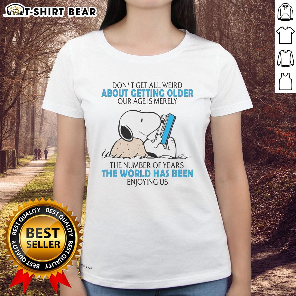 Official Snoopy 'Don't Get All Weird About Getting Older' ladies tee showcasing a fun design celebrating aging with humor.