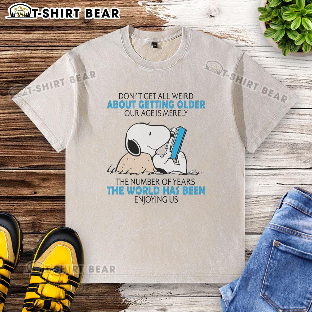 Official Snoopy Don't Get All Weird About Getting Older T-shirt featuring a fun age quote on a washed design.