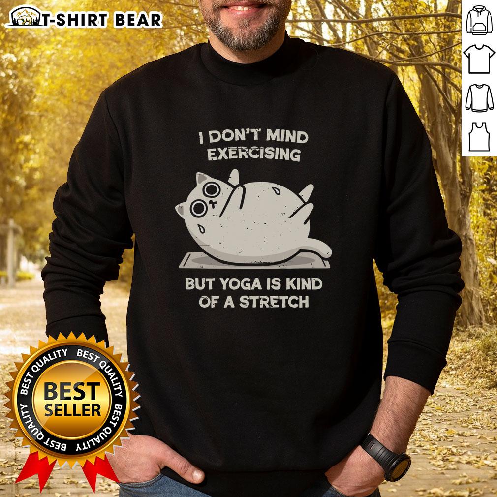 Original I Dont Mind Exercising But Yoga Is Kind Of A Stretch sweatshirt in a cozy setting, perfect for fitness enthusiasts.