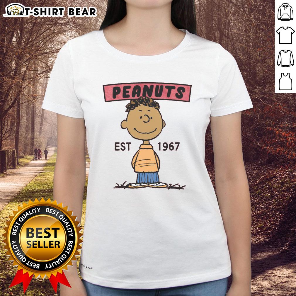 Pretty Peanuts Franklin Est 1967 Ladies Tee featuring a stylish graphic design of Franklin from Peanuts.