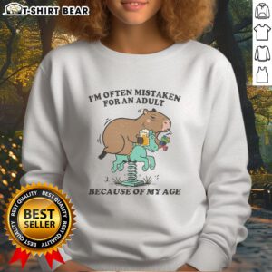 Capybara sweatshirt featuring the phrase 'Top I'm Often Mistaken For An Adult Because Of My Age' in stylish font.