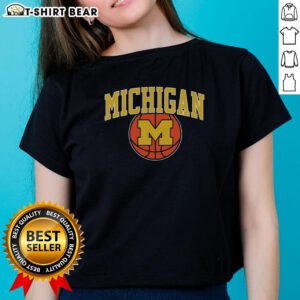 Vintage ladies tee featuring Michigan basketball design, perfect for fans and stylish sportswear enthusiasts.