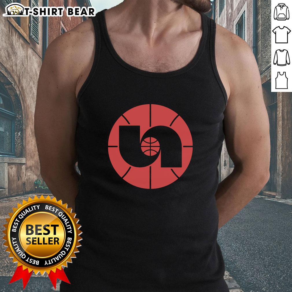 Vintage 1980s Nebraska Basketball logo tank top featuring bold colors and classic design, perfect for fans and collectors.