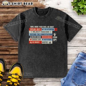 Good Now More Than Ever We Must Feminist Washed T-Shirt featuring a bold feminist slogan on a soft fabric background.
