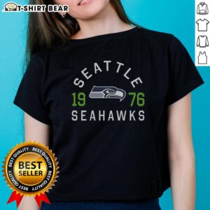 Hot Seattle Seahawks Heritage Print Ladies Tee showcasing team pride with stylish graphics and a comfortable fit.