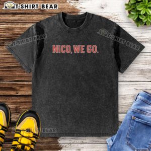 Alt Text: Nico Hoerner wearing a Chicago Cubs baseball washed t-shirt, showcasing team spirit and style on game day.