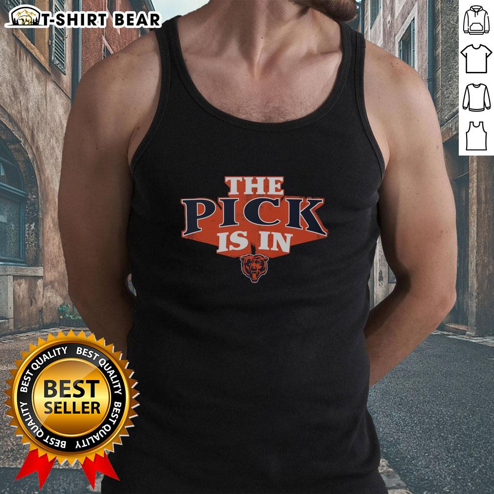 Chicago Bears fan wearing an official tank top celebrating the team's draft pick announcement.