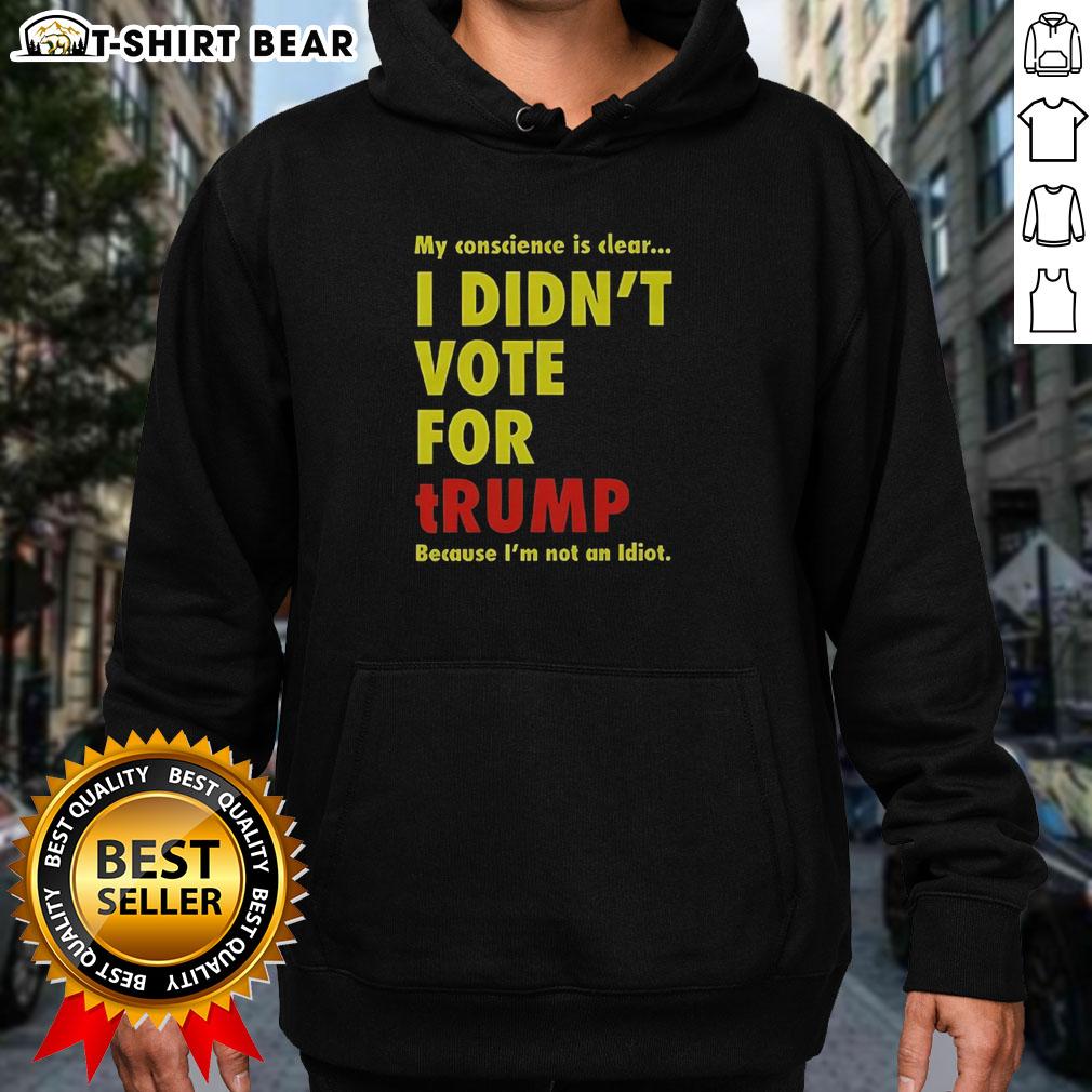 Alt Text: Official My Conscience Is Clear I Didn't Vote For Trump Hoodie showcasing a bold, statement-making design.