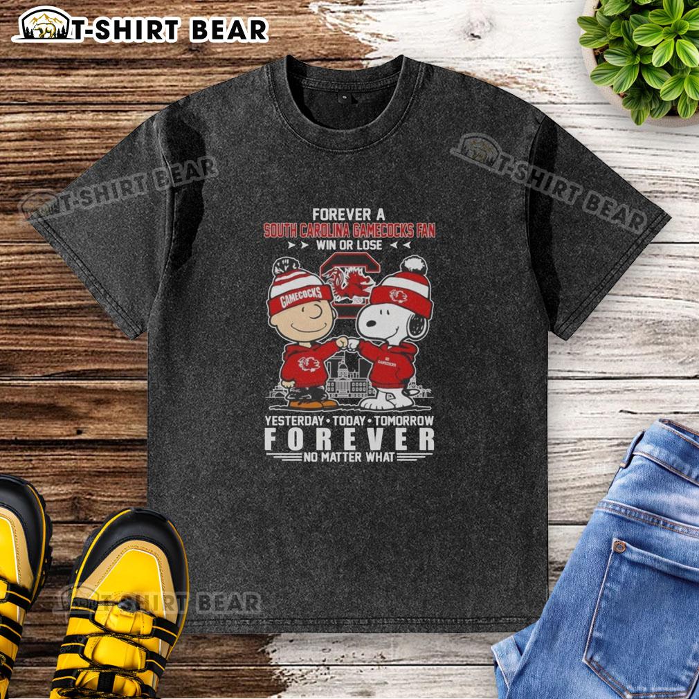 Alt Text: Official South Carolina Gamecocks Snoopy and Charlie Brown Forever A Fan Win or Lose washed t-shirt design.
