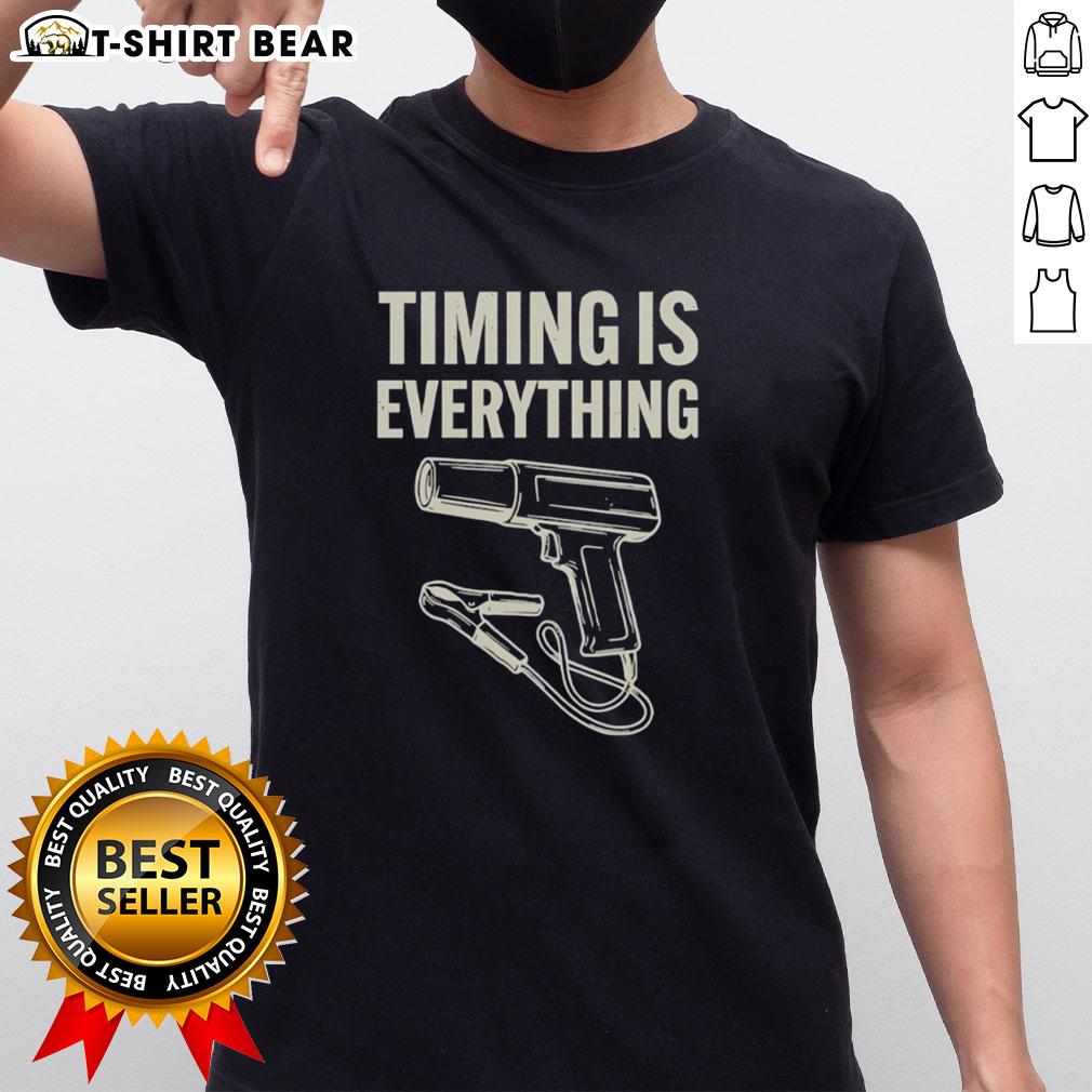 Original Timing Is Everything Funny T-Shirt featuring a humorous clock graphic and bold text design for casual wear.