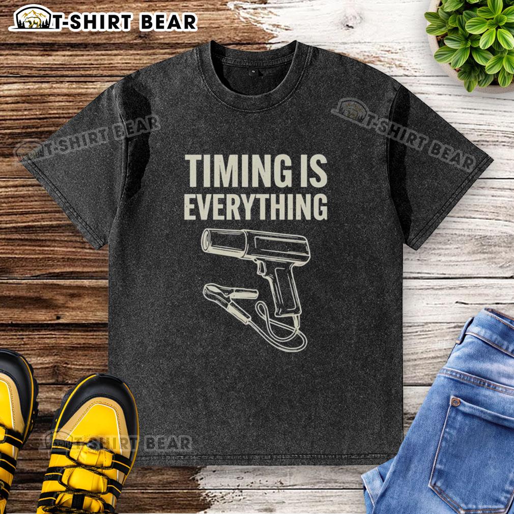 Funny washed t-shirt featuring Original Timing Is Everything slogan, perfect for casual wear or gifting.