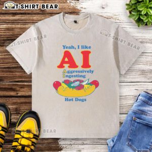 Alt Text: Original design of a t-shirt featuring AI humor with a graphic of a robot aggressively ingesting hot dogs.