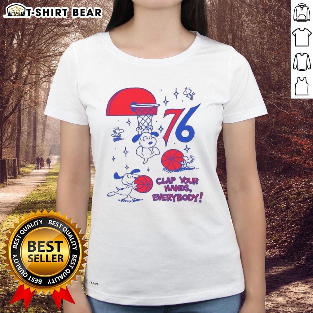 Alt Text: Premium Philadelphia 76ers X Snoopy and Woodstock Clap Your Hands Everybody Ladies Tee in vibrant colors and stylish design.