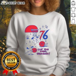 Premium Philadelphia 76ers X Snoopy and Woodstock sweatshirt featuring vibrant graphics and a cozy fit for fans.