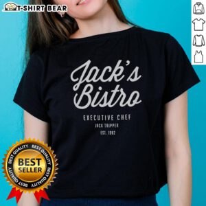 Alt Text: Top Jacks Bistro Executive Chef Jack Tripper wearing a stylish ladies tee, established in 1982, showcasing culinary passion.