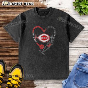Top Cincinnati Reds stethoscope heartbeat design on a washed t-shirt, perfect for fans and healthcare professionals.