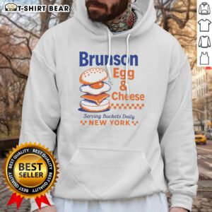 Official Brunson Egg & Cheese Serving Buckets Daily NEW YORK Jalen Brunson Hoodie in black, front view with drawstring hood and kangaroo pocket