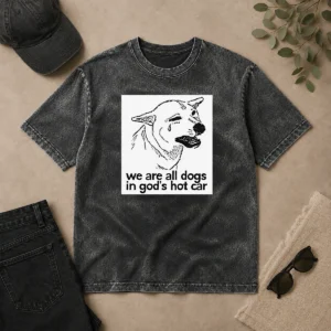 Original We Are All Dogs In Gods Hot Car washed t shirt in a soft, faded gray color showing front print design