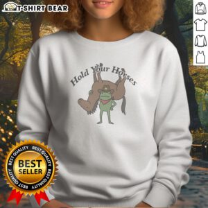 Premium Hold Your Horses Frog Cowboy Humor Funny Animal Sweatshirt featuring a playful frog cowboy graphic on a cozy sweatshirt