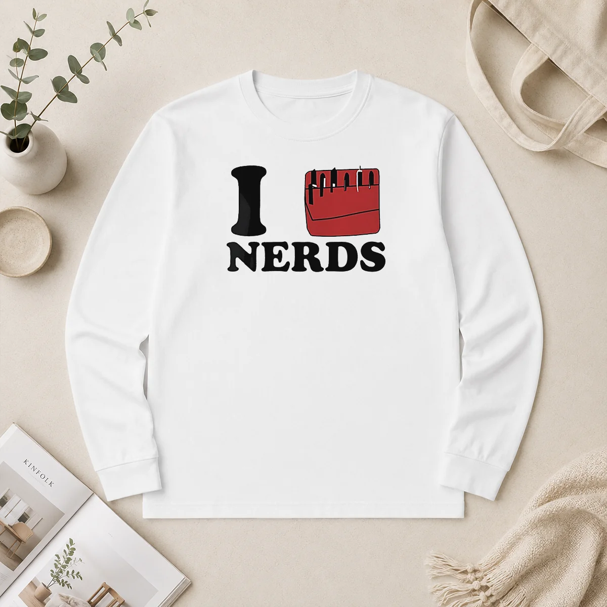 Premium I Love Nerds Pocket Protector Long Sleeve Premium I Love Nerds Pocket Protector long sleeve shirt in white with front pocket design and bold text