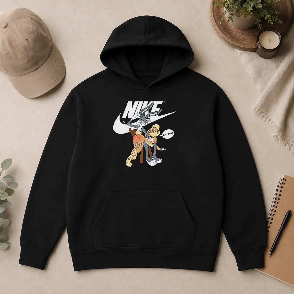 Top Nike Bugs Bunny Spanking Lola Hoodie Top Nike Bugs Bunny Spanking Lola Hoodie featuring a graphic print on a comfortable pullover hoodie