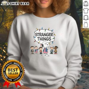 Top Snoopy Eleven Peanuts Stranger Things Characters And Lights Sweatshirt featuring vibrant graphics and cozy fit