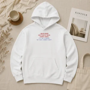 Good Awesome I Am No Longer Accepting The Things I Cannot Change Its Time To Change hoodie in charcoal gray with front pocket and drawstring hood