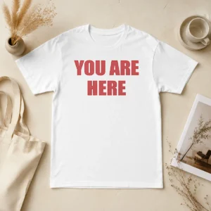 Happy Pretty Cruz Beckham You Are Here t shirt in white with bold graphic print, short sleeve cotton tee