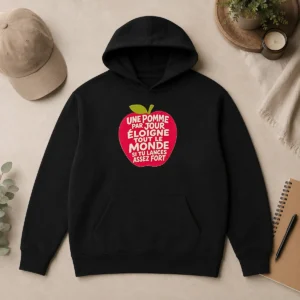 Premium Good Une Pomme Par Jour Eloigne Tout Le Monde Si Tu Lances Assez Fort Humor Hoodie in black, front view with drawstring hood and kangaroo pocket