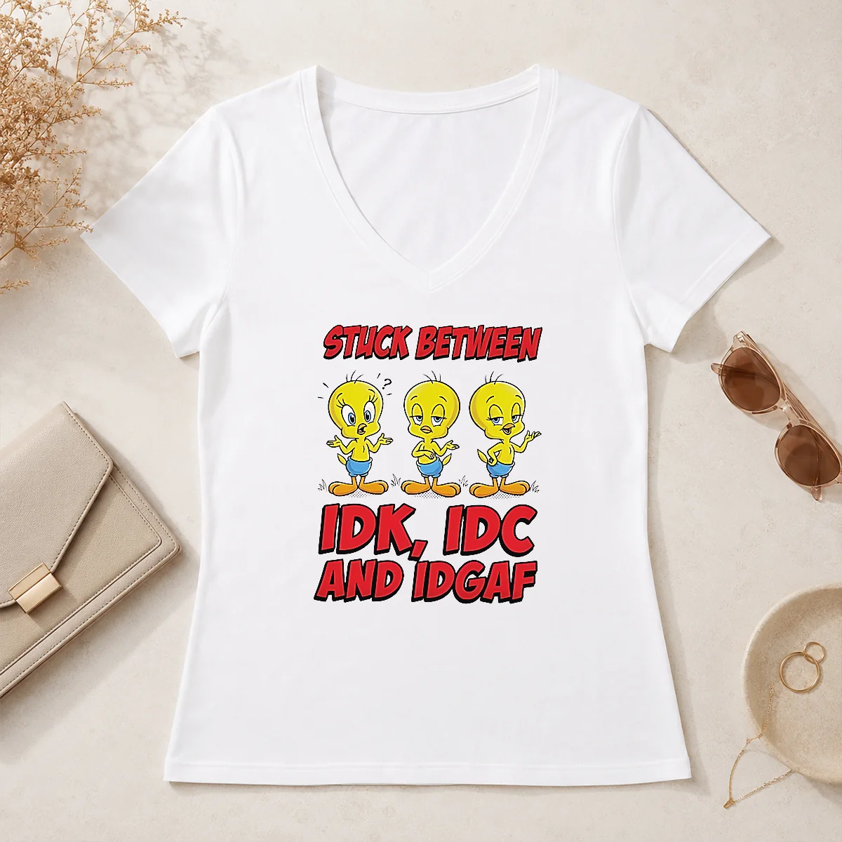 Pretty Tweety Stuck Between IDK IDC V-Neck Shirt Pretty Tweety Stuck Between IDK IDC V-Neck Shirt
