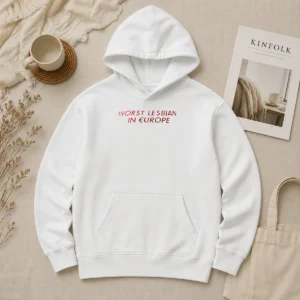 Pretty Worst Lesbian In Europe Text Hoodie in black, featuring bold white text across the chest, displayed on a front-facing mannequin